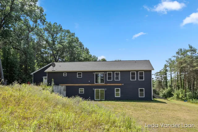 $565,000 | 7385 14 Mile Road Northeast, Cedar Springs, MI 49319