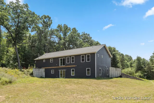 $565,000 | 7385 14 Mile Road Northeast, Cedar Springs, MI 49319