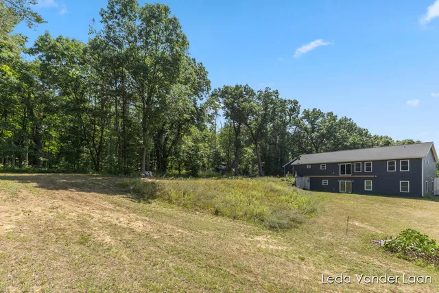 $565,000 | 7385 14 Mile Road Northeast, Cedar Springs, MI 49319