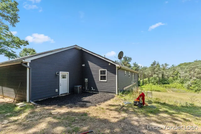 $565,000 | 7385 14 Mile Road Northeast, Cedar Springs, MI 49319