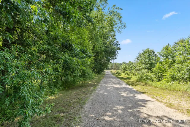 $565,000 | 7385 14 Mile Road Northeast, Cedar Springs, MI 49319