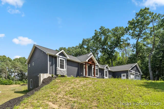 $565,000 | 7385 14 Mile Road Northeast, Cedar Springs, MI 49319