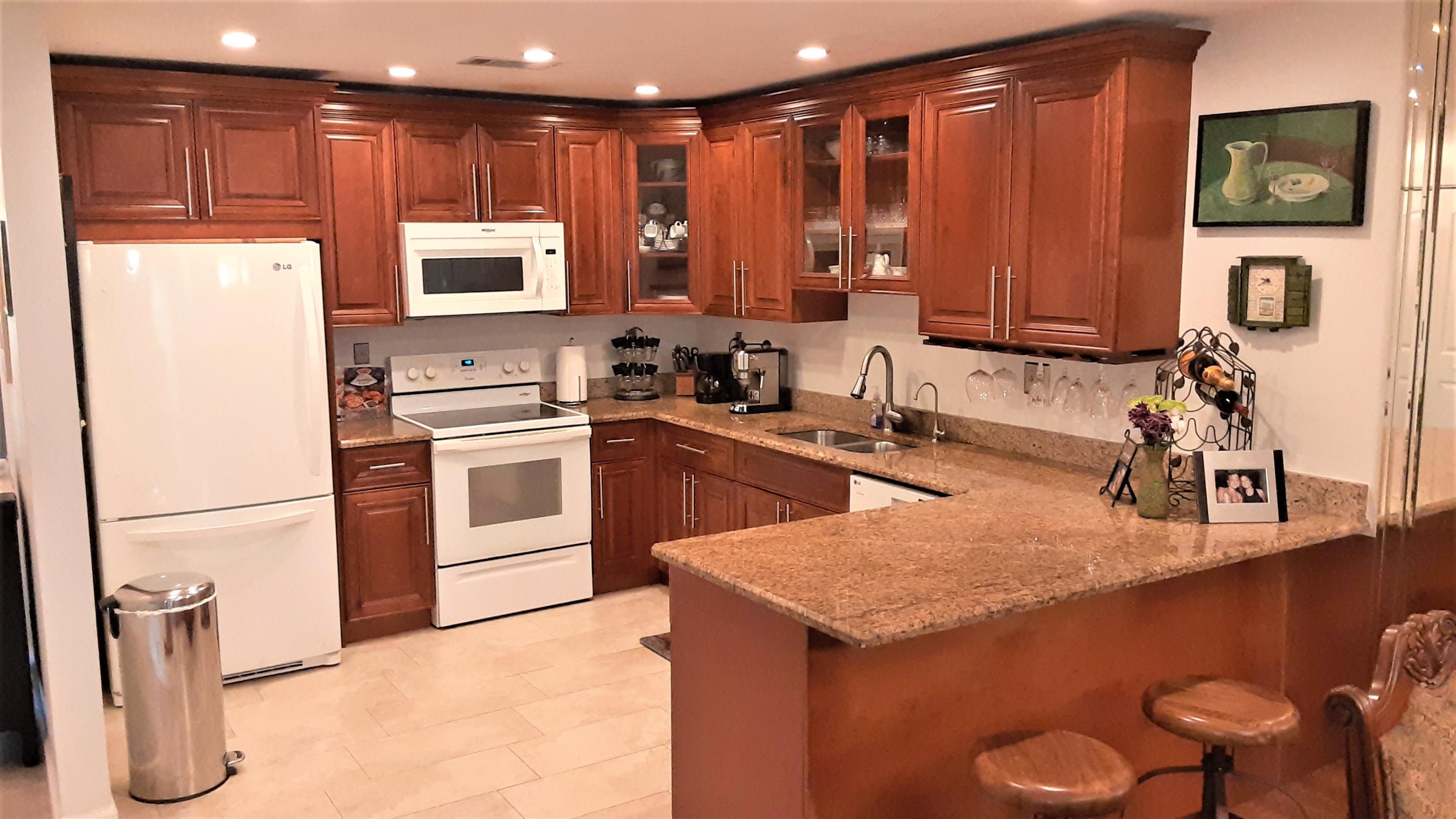 23426 Southwest 54th Way, Unit D Boca Raton, FL 33433 - Photo 11 of 43 open kitchen