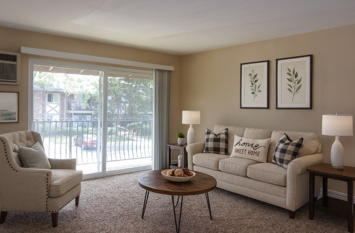 9-s110 S Frontage Road, Unit 205 Darien, IL 60527 - Photo 4 of 7 a living room with furniture and a potted plant