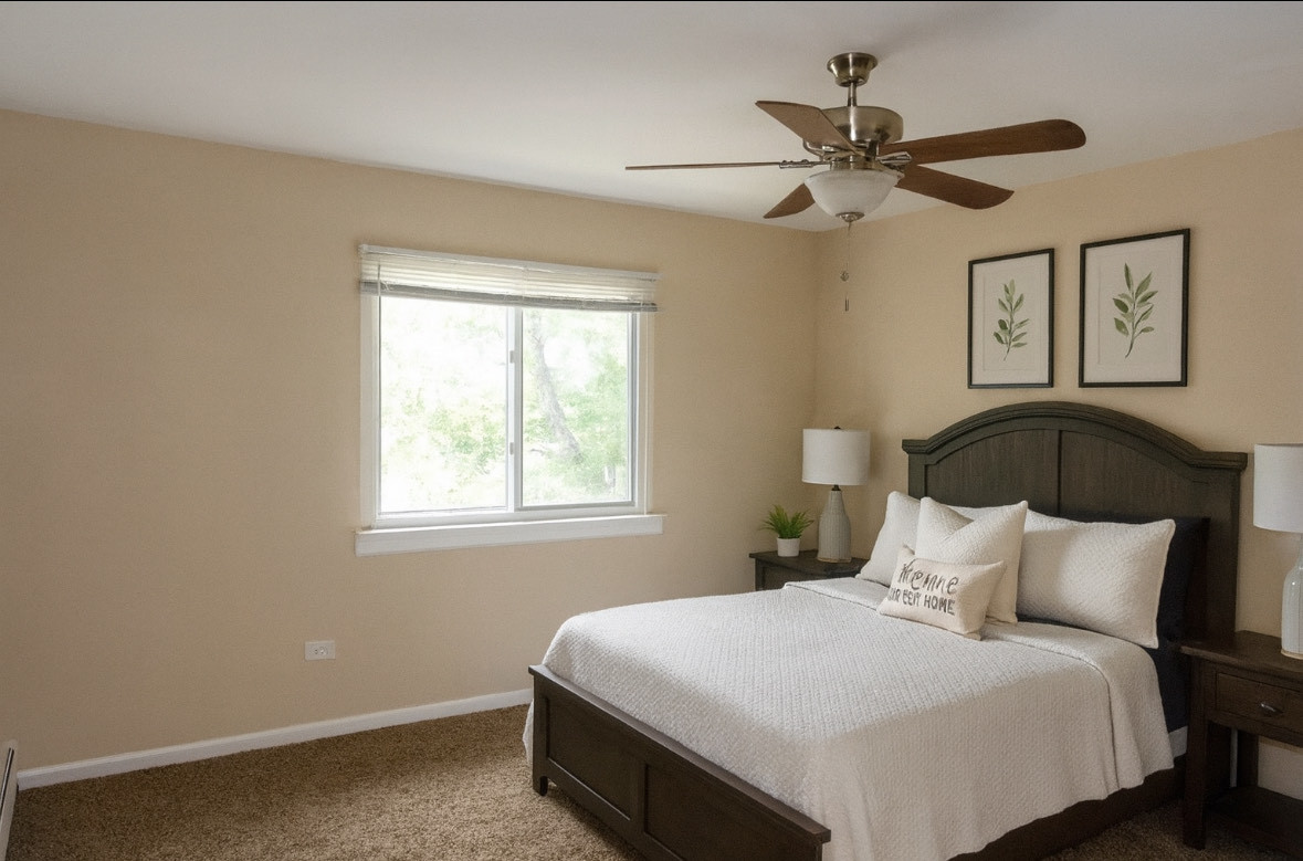 9-s110 S Frontage Road, Unit 205 Darien, IL 60527 - Photo 7 of 7 a bedroom with a bed and window