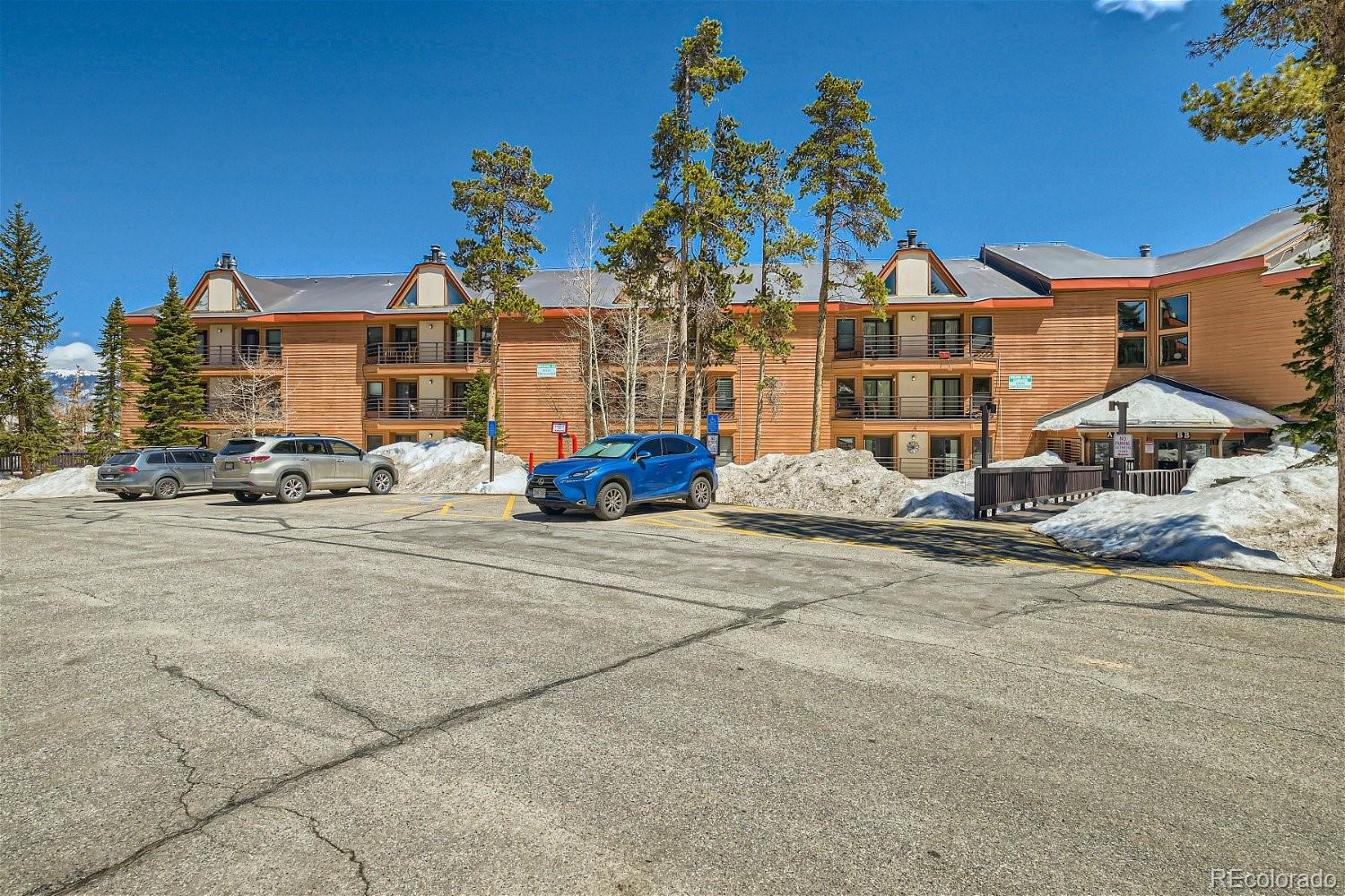89100 Ryan Gulch Road, Unit 206 Silverthorne, CO 80498 - Photo 16 of 17 a car parked in front of a building
