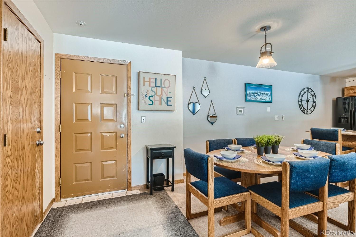 89100 Ryan Gulch Road, Unit 206 Silverthorne, CO 80498 - Photo 4 of 17 a view of a livingroom with furniture and window