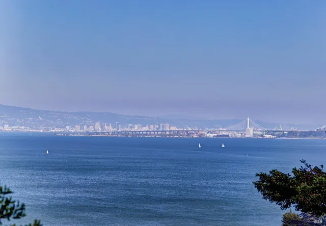 a view of an ocean beach and mountain view