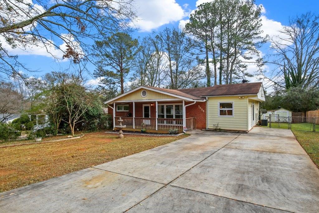 3053 Brook Drive Decatur, GA 30033 - Photo 1 of 1 a front view of a house with yard