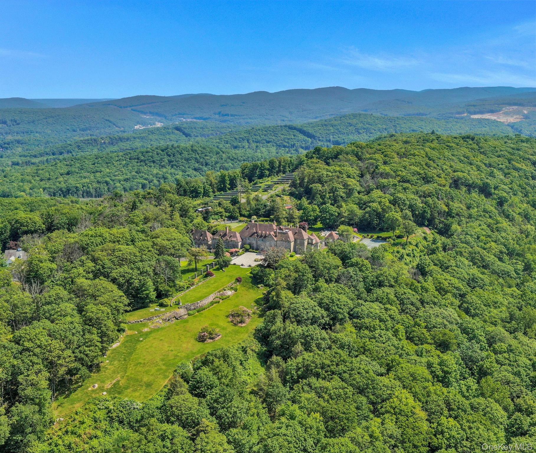 120 Ridge Road Tuxedo Park, NY 10987 - Photo 50 of 50 Bird's eye view of a forest and a mountainous background