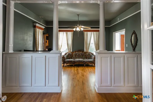 a bathroom with a sink a mirror and shower