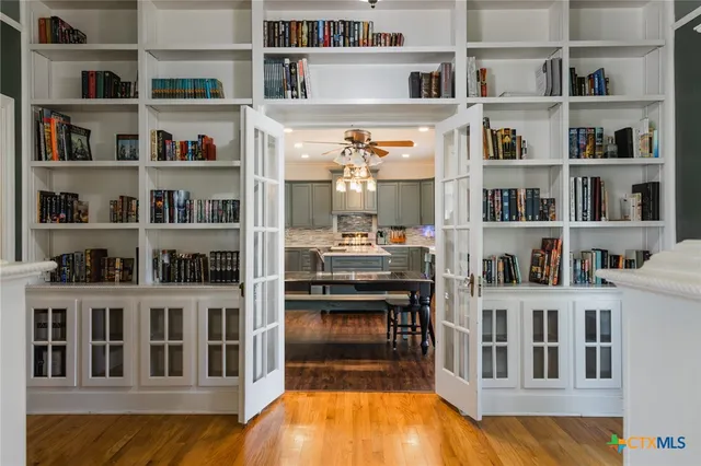 a view of a kitchen with cabinets