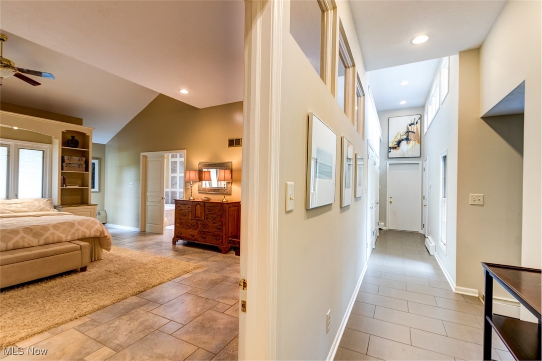 10850 Prouty Road Painesville, OH 44077 - Photo 21 of 50 Newer addition with hallway to master suite, garage and basement
