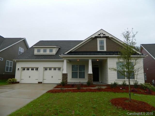 5202 Waterloo Drive, Unit CC174 Tega Cay, SC 29708 - Photo 1 of 15 front view of a house with a yard