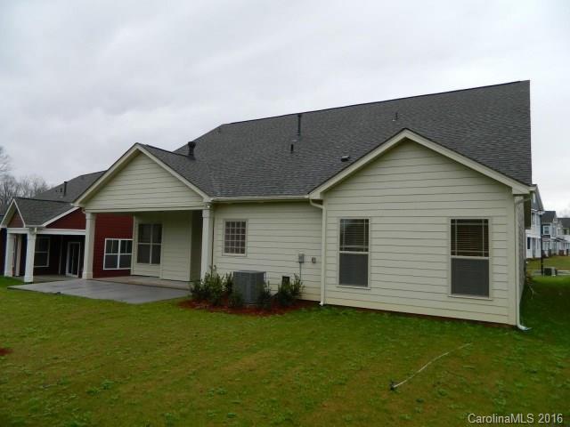5202 Waterloo Drive, Unit CC174 Tega Cay, SC 29708 - Photo 2 of 15 a view of a house with a backyard