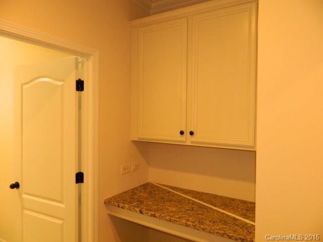 5202 Waterloo Drive, Unit CC174 Tega Cay, SC 29708 - Photo 9 of 15 a bathroom with a shower