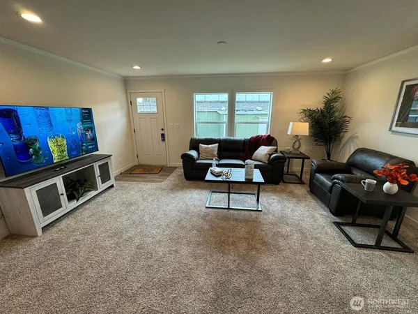 a kitchen with stainless steel appliances granite countertop a sink and a stove