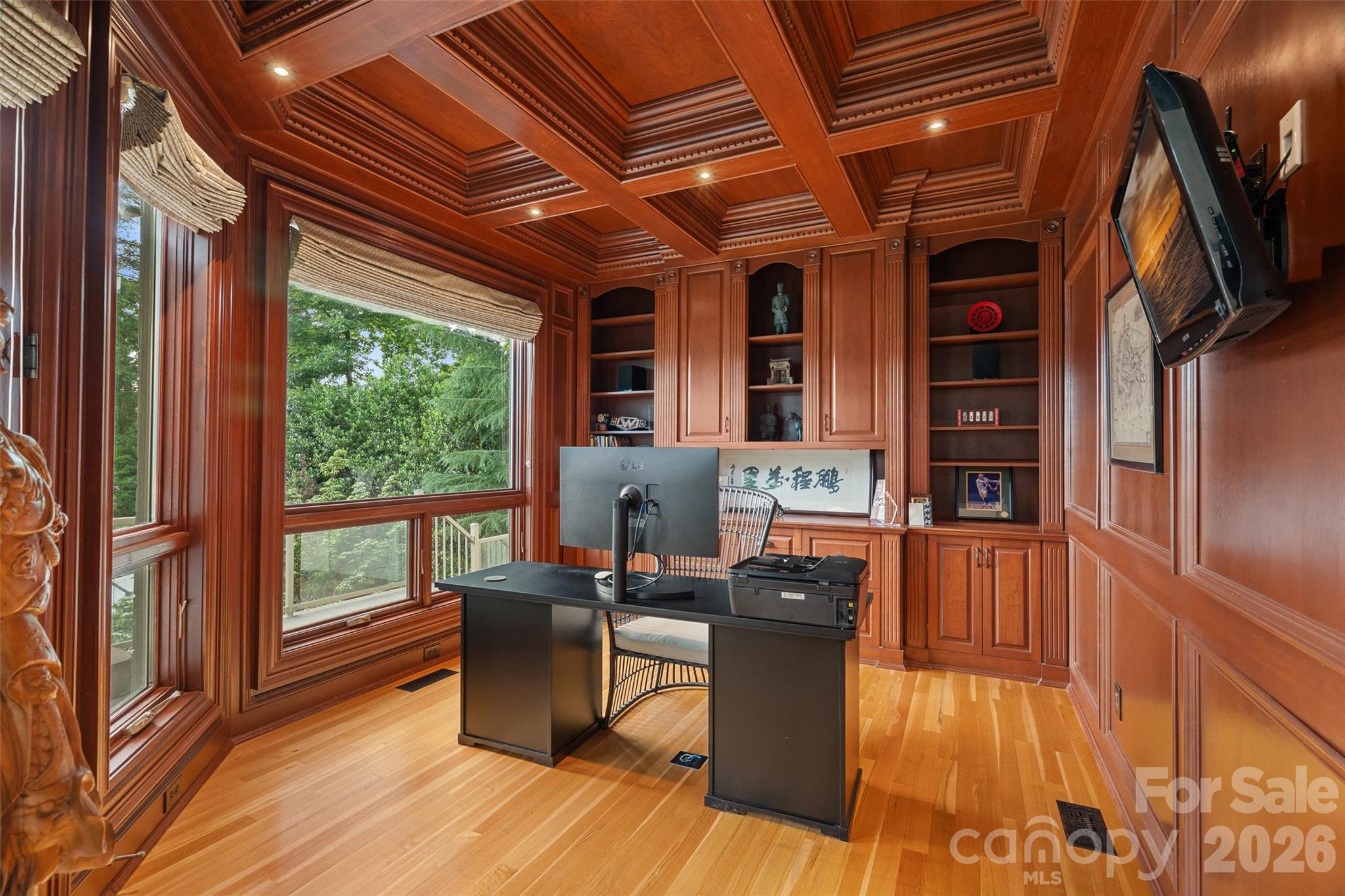 461 Kemp Road Mooresville, NC 28117 - Photo 20 of 48 a workspace with wooden floor and furniture