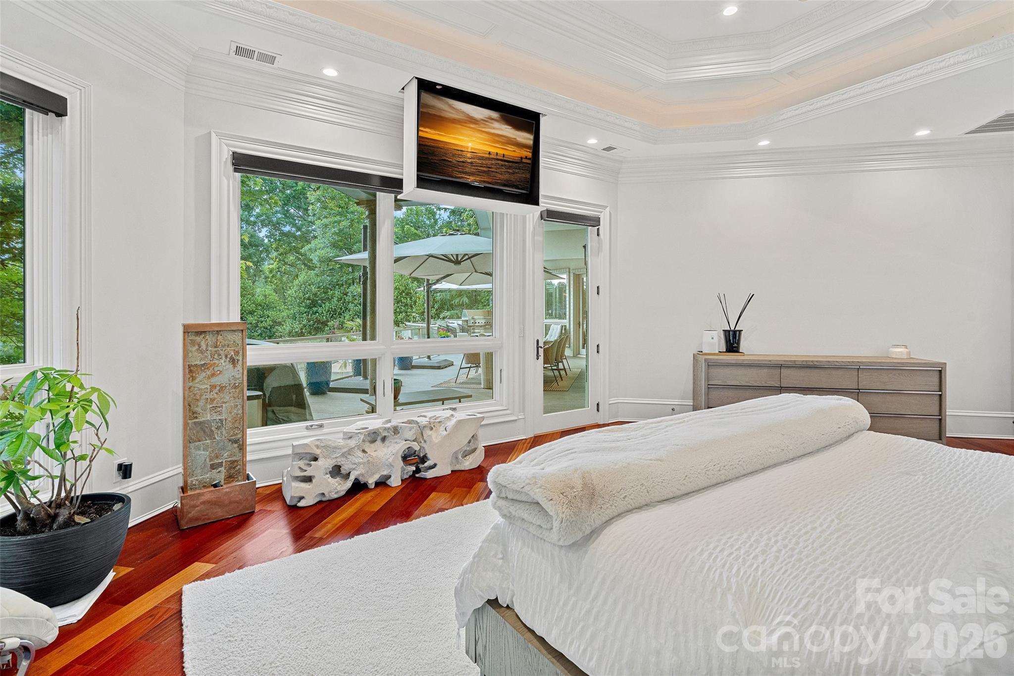 461 Kemp Road Mooresville, NC 28117 - Photo 22 of 48 a bedroom with a bed and large windows