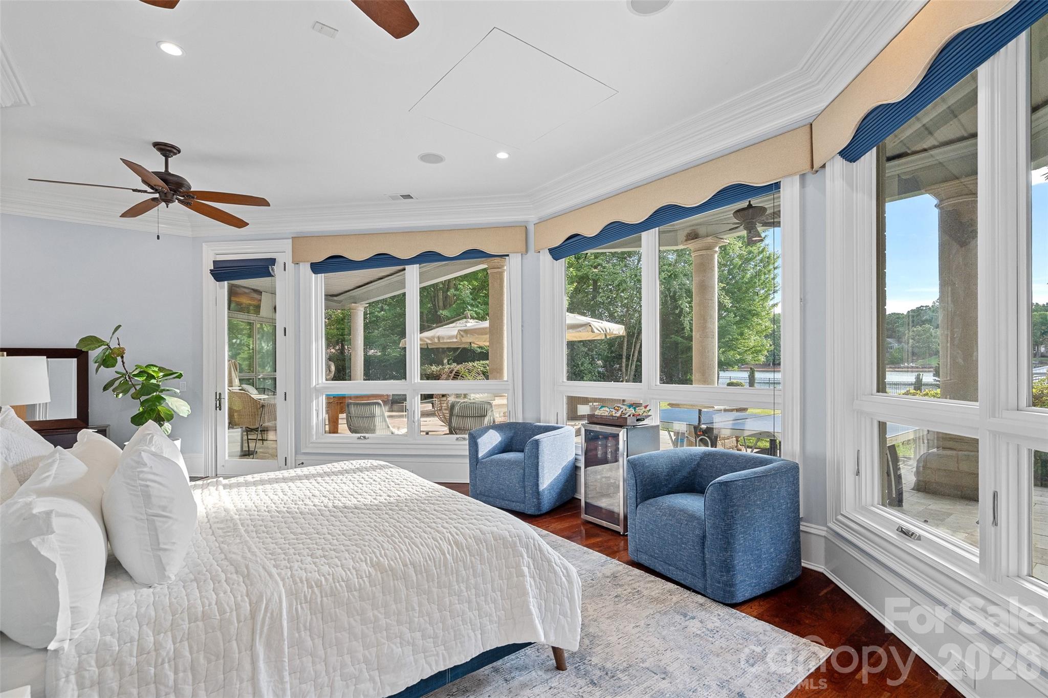 461 Kemp Road Mooresville, NC 28117 - Photo 34 of 48 a spacious bedroom with a large bed and a large window