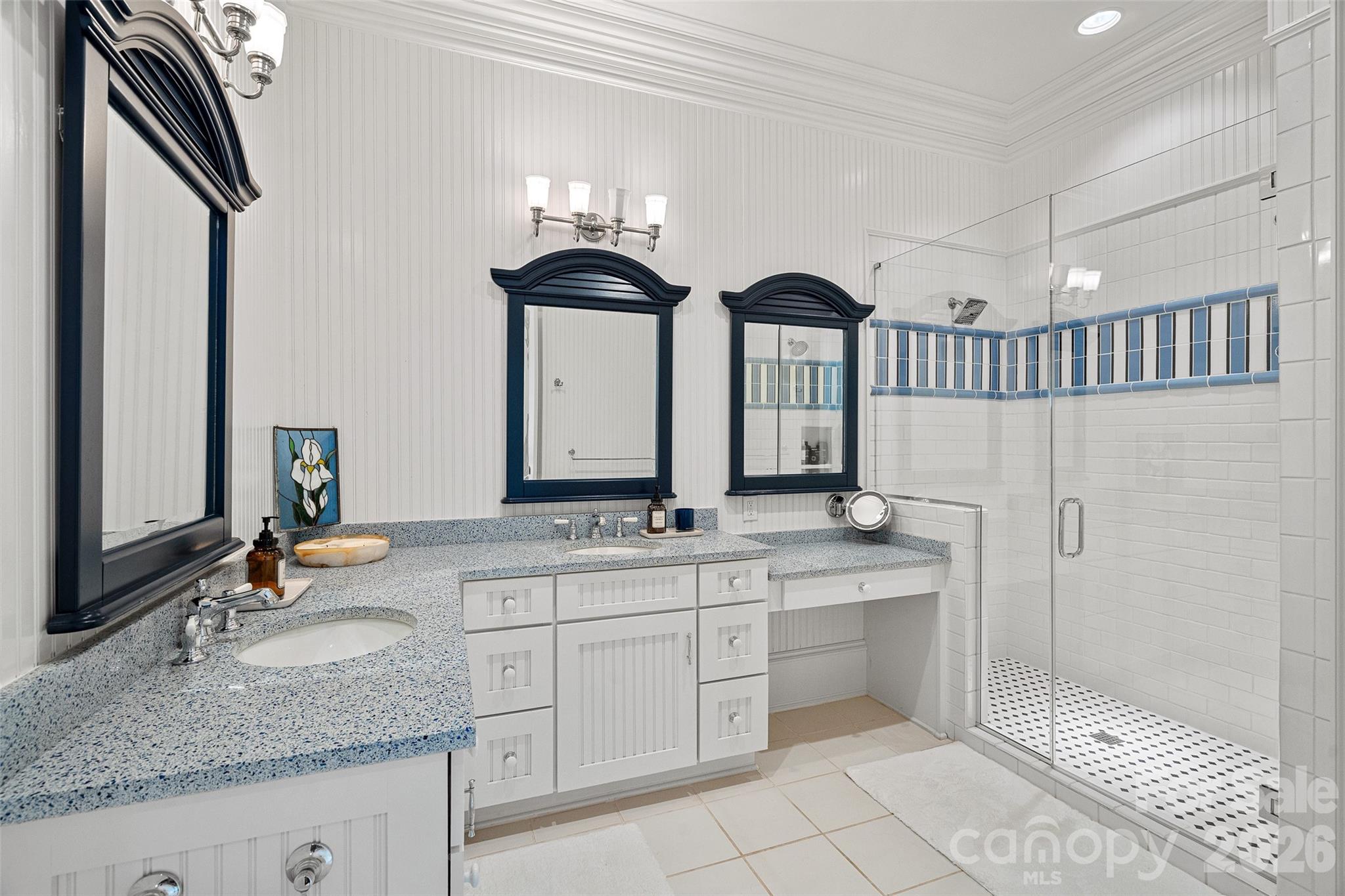 461 Kemp Road Mooresville, NC 28117 - Photo 35 of 48 a bathroom with double sink and a mirror