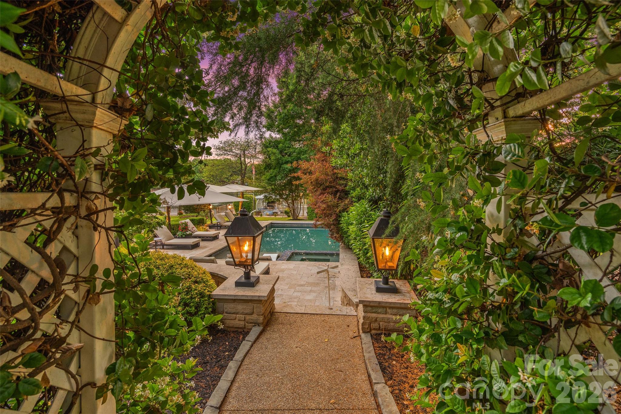 461 Kemp Road Mooresville, NC 28117 - Photo 5 of 48 a view of a pathway with a bench