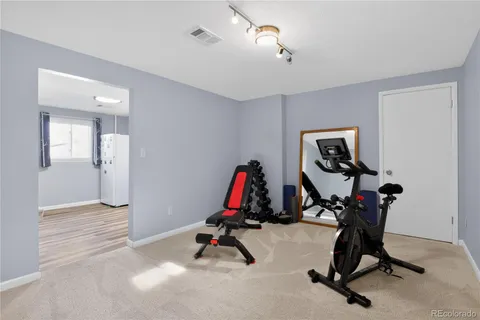 a view of a room with gym equipment