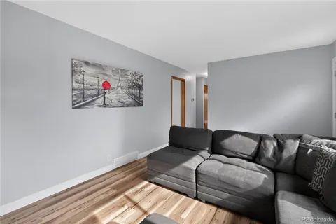 a living room with furniture and a couch