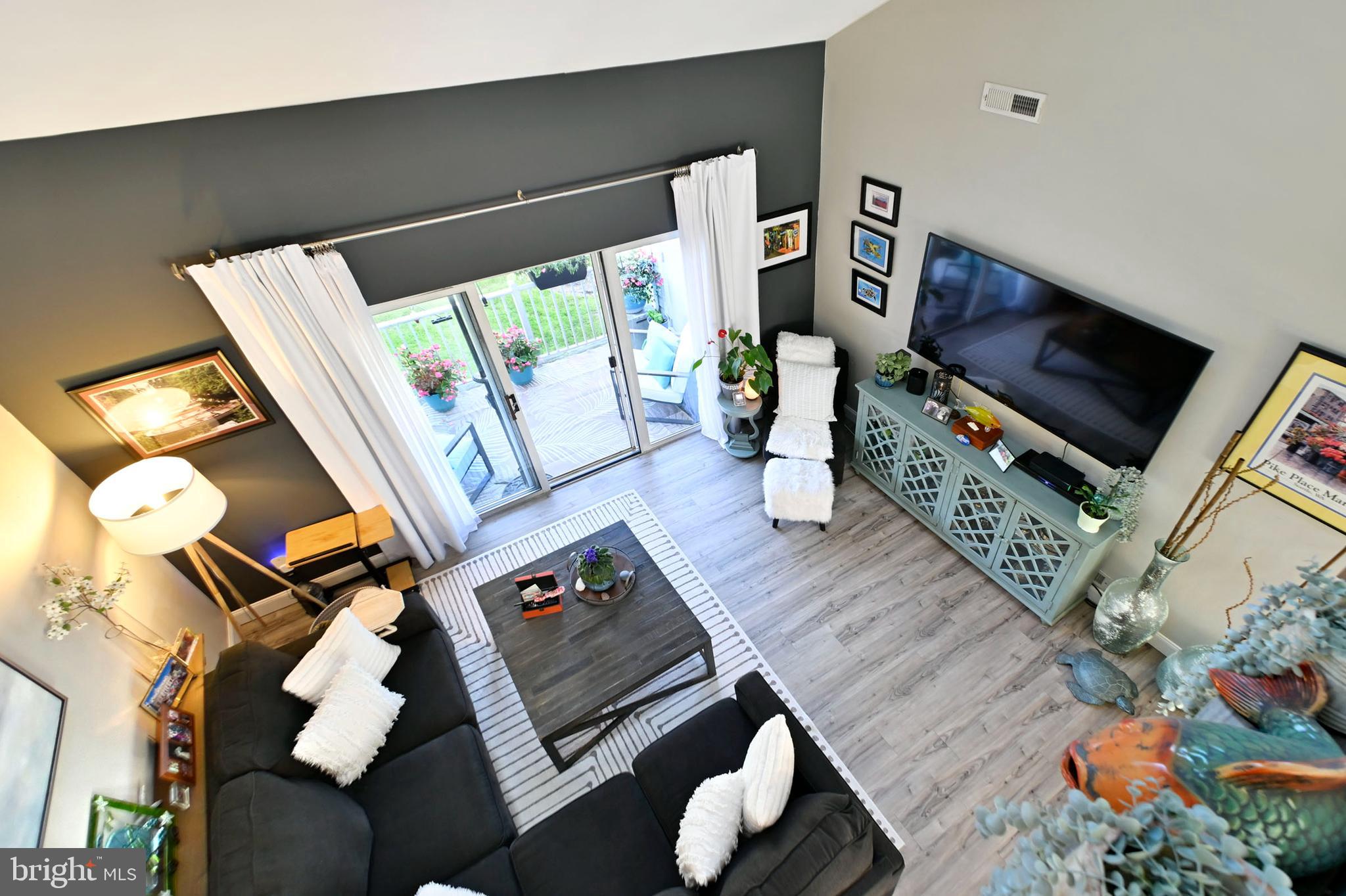 1108 Squirrel Road Marlton, NJ 08053 - Photo 6 of 30 a living room with furniture and a flat screen tv