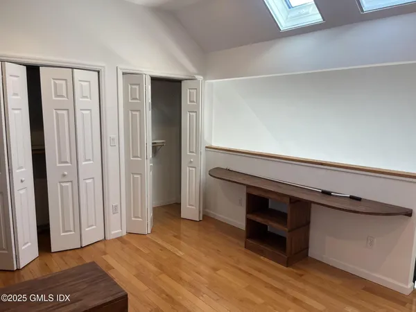 a view of kitchen and wooden floor