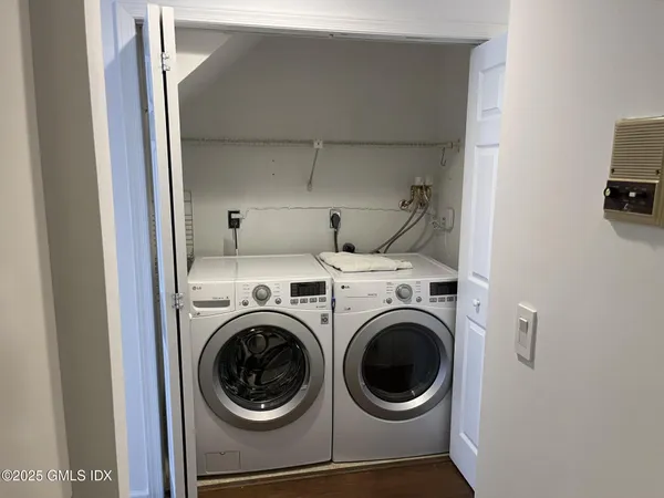 a utility room with dryer and washer