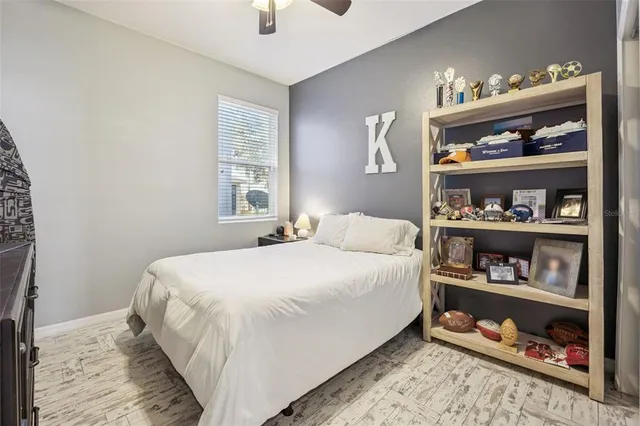 a view of a dining room with furniture large windows and wooden floor