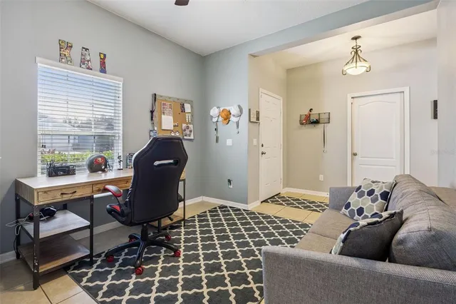 a kitchen with stainless steel appliances granite countertop a sink a microwave and refrigerator