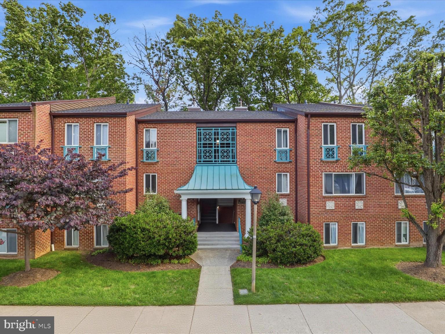 11809 Breton Court, Unit 2B Reston, VA 20191 - Photo 24 of 29 a front view of a house with garden