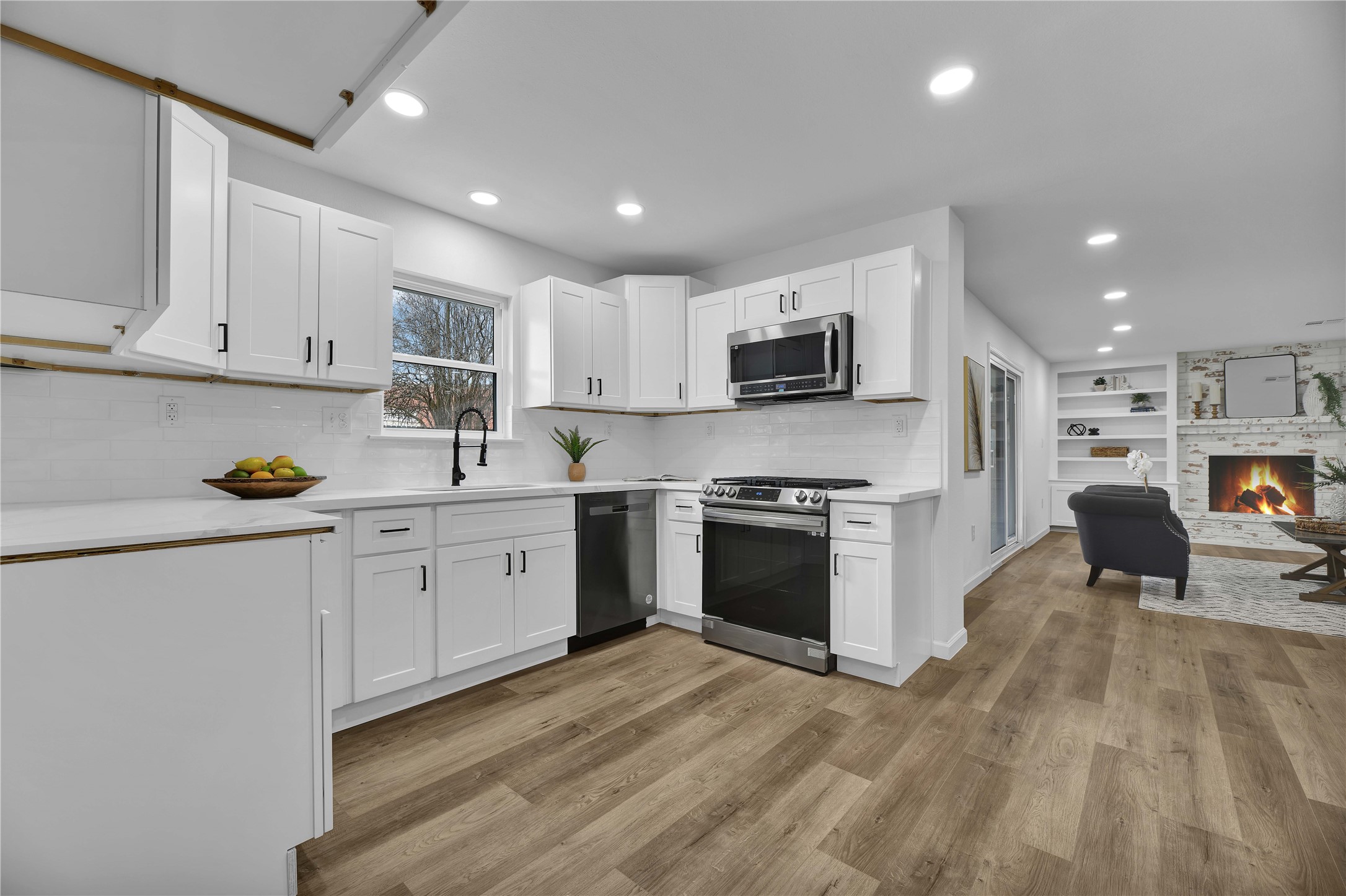 2726 Stetson Lane Houston, TX 77043 - Photo 14 of 36 Spacious kitchen featuring ample counter space, modern appliances, and a layout designed for effortless meal prep.