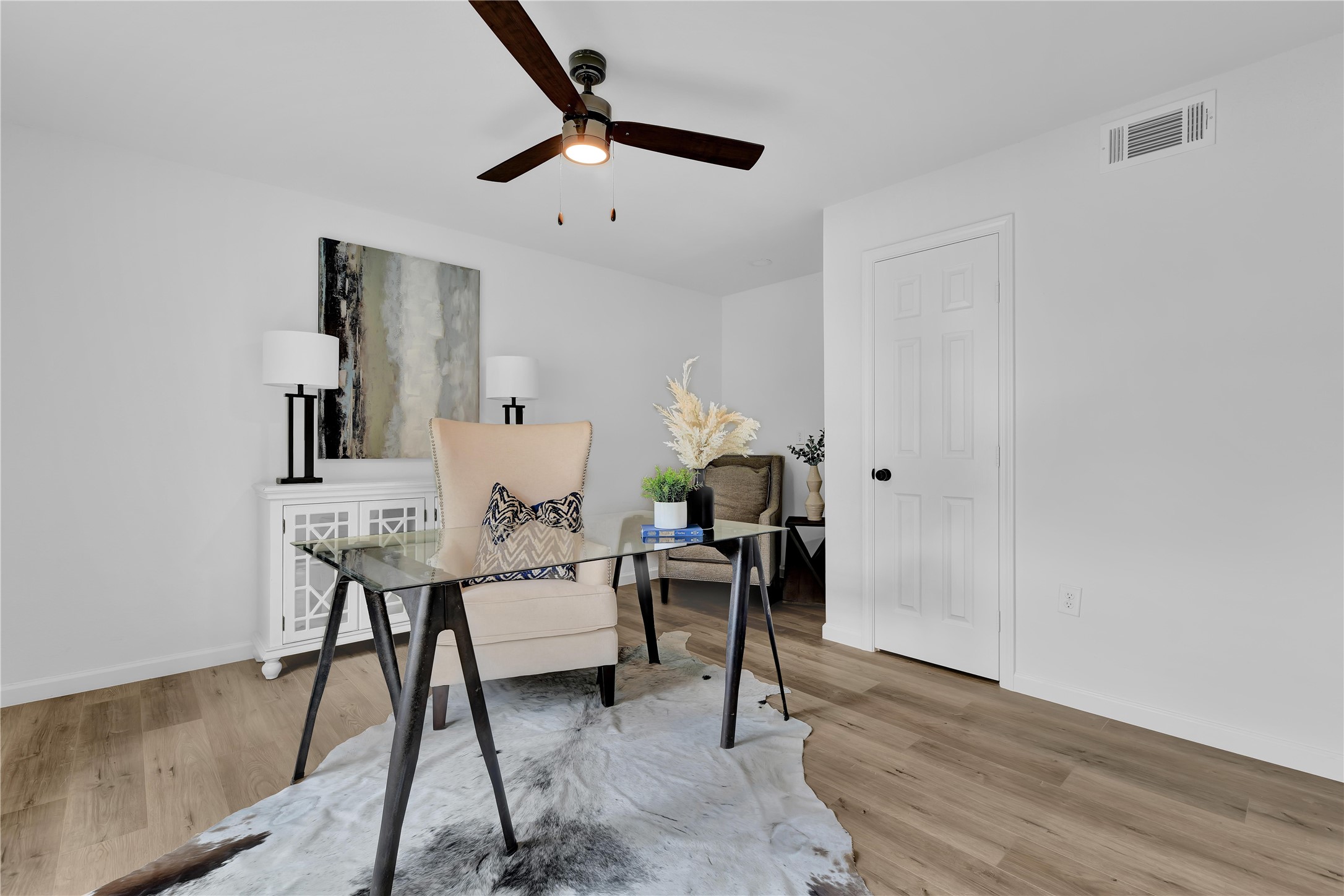 2726 Stetson Lane Houston, TX 77043 - Photo 21 of 36 Private office with abundant natural light and flexible functionality, ideal for working from home or use as a fifth bedroom.