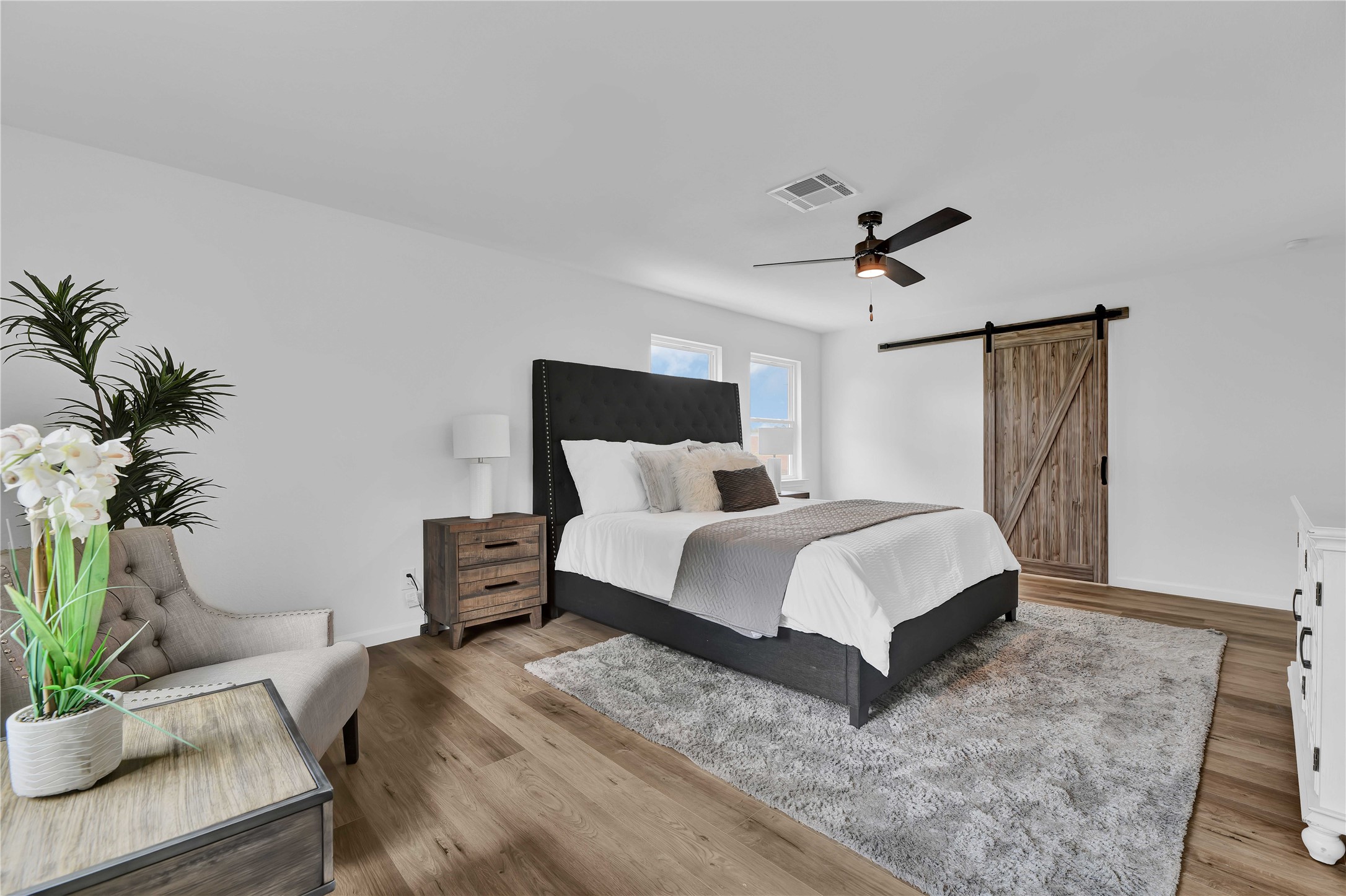 2726 Stetson Lane Houston, TX 77043 - Photo 24 of 36 Thoughtful sliding door design offers easy access from the primary suite to the luxurious bath.