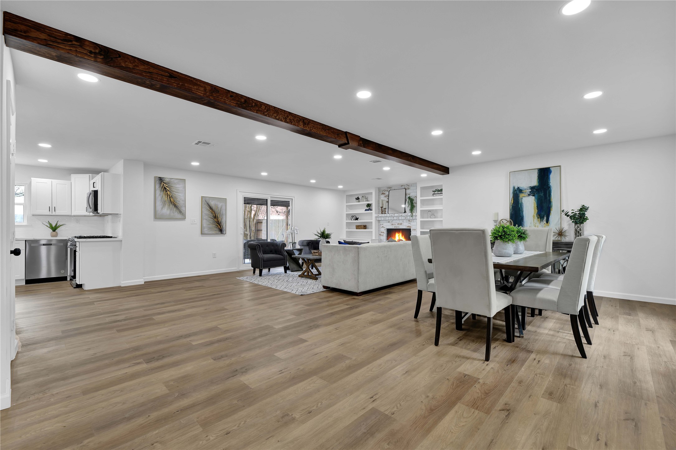 2726 Stetson Lane Houston, TX 77043 - Photo 4 of 36 Home is staged for photos. Elegant living room with natural light and plenty of space for entertaining or relaxing.