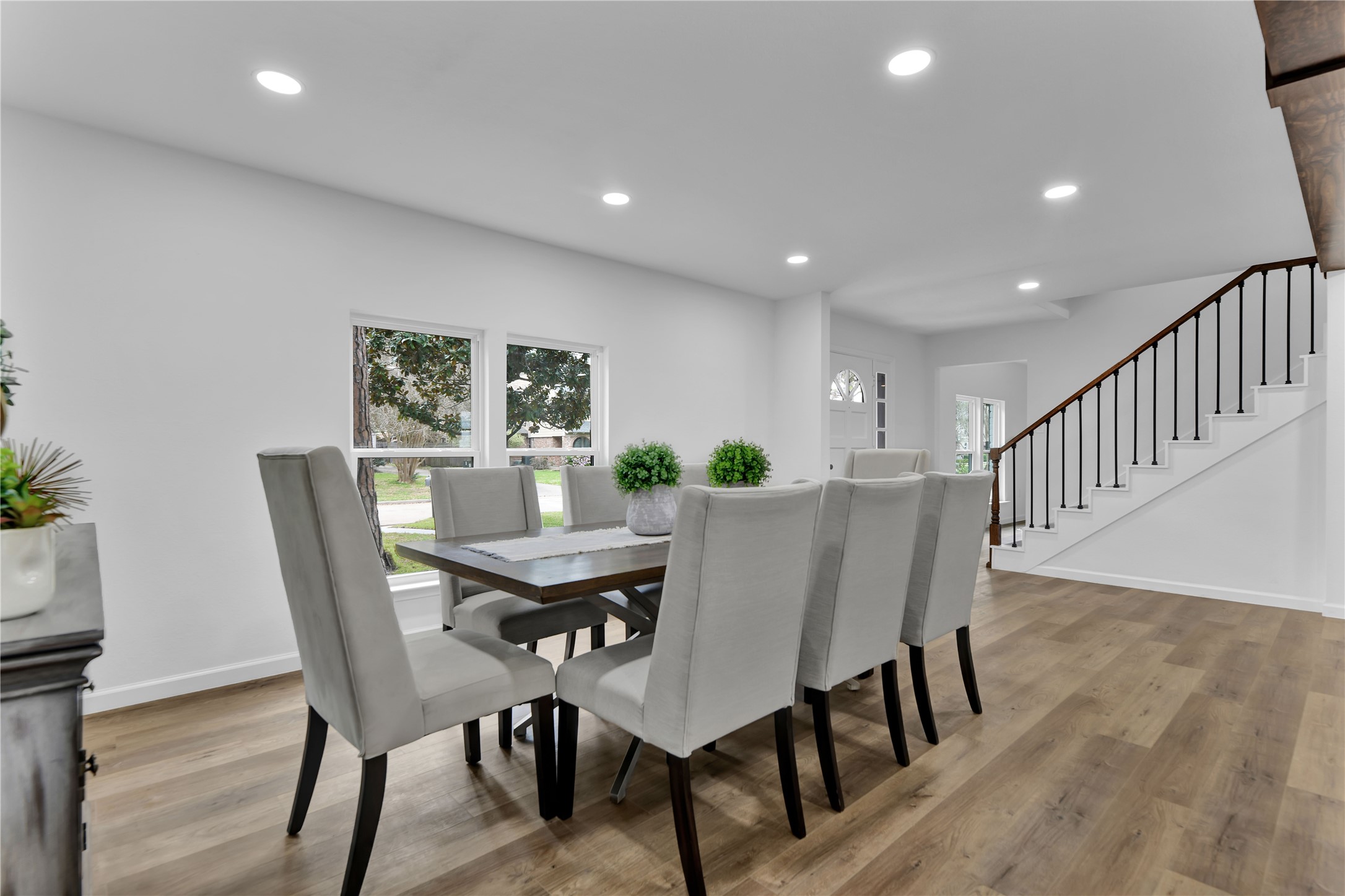 2726 Stetson Lane Houston, TX 77043 - Photo 6 of 36 Beautiful luxury vinyl plank flooring creates a seamless flow from room to room with lasting durability for daily living.