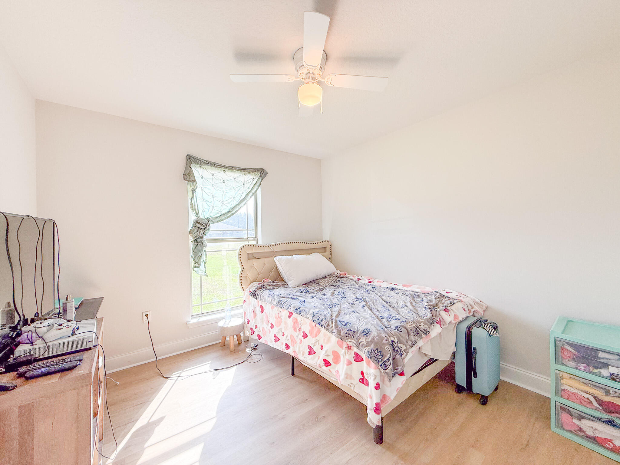 6214 Flash Lane Crestview, FL 32536 - Photo 37 of 42 a bedroom with a bed and a window