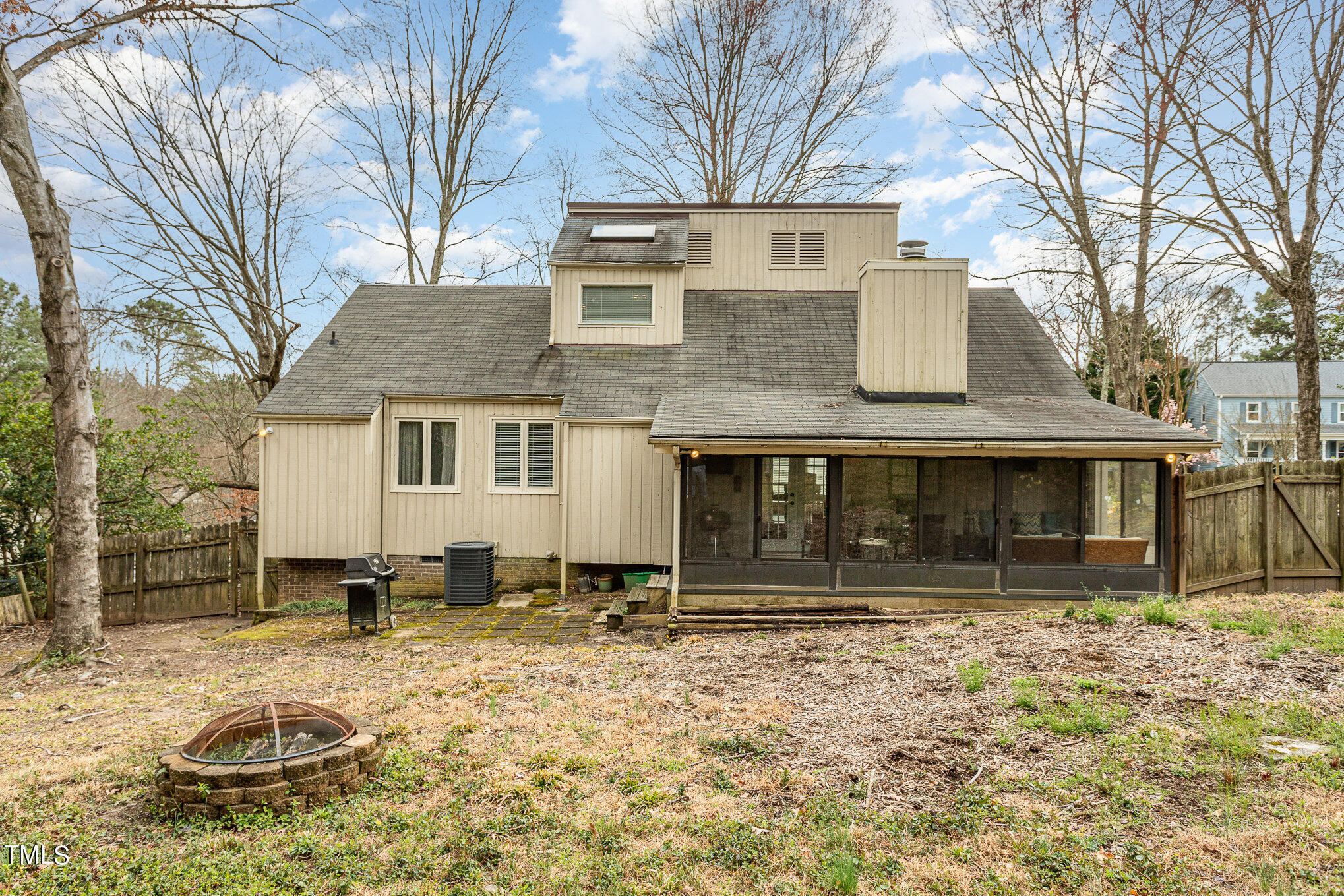 6913 Three Bridges Circle Raleigh, NC 27613 - Photo 28 of 28 a front view of a house with a yard