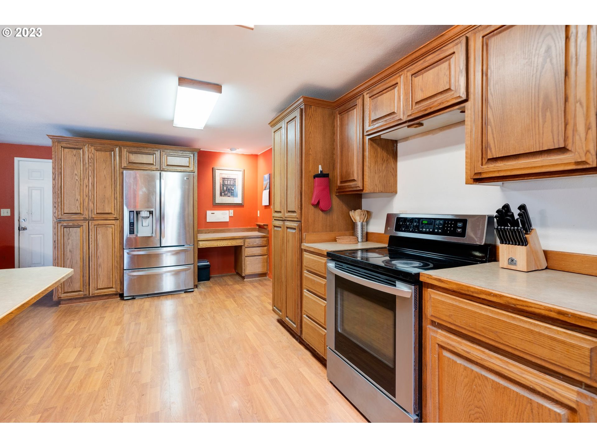 17802 Northeast 219th Street Battle Ground, WA 98604 - Photo 13 of 42 a kitchen with stainless steel appliances granite countertop a stove and a sink