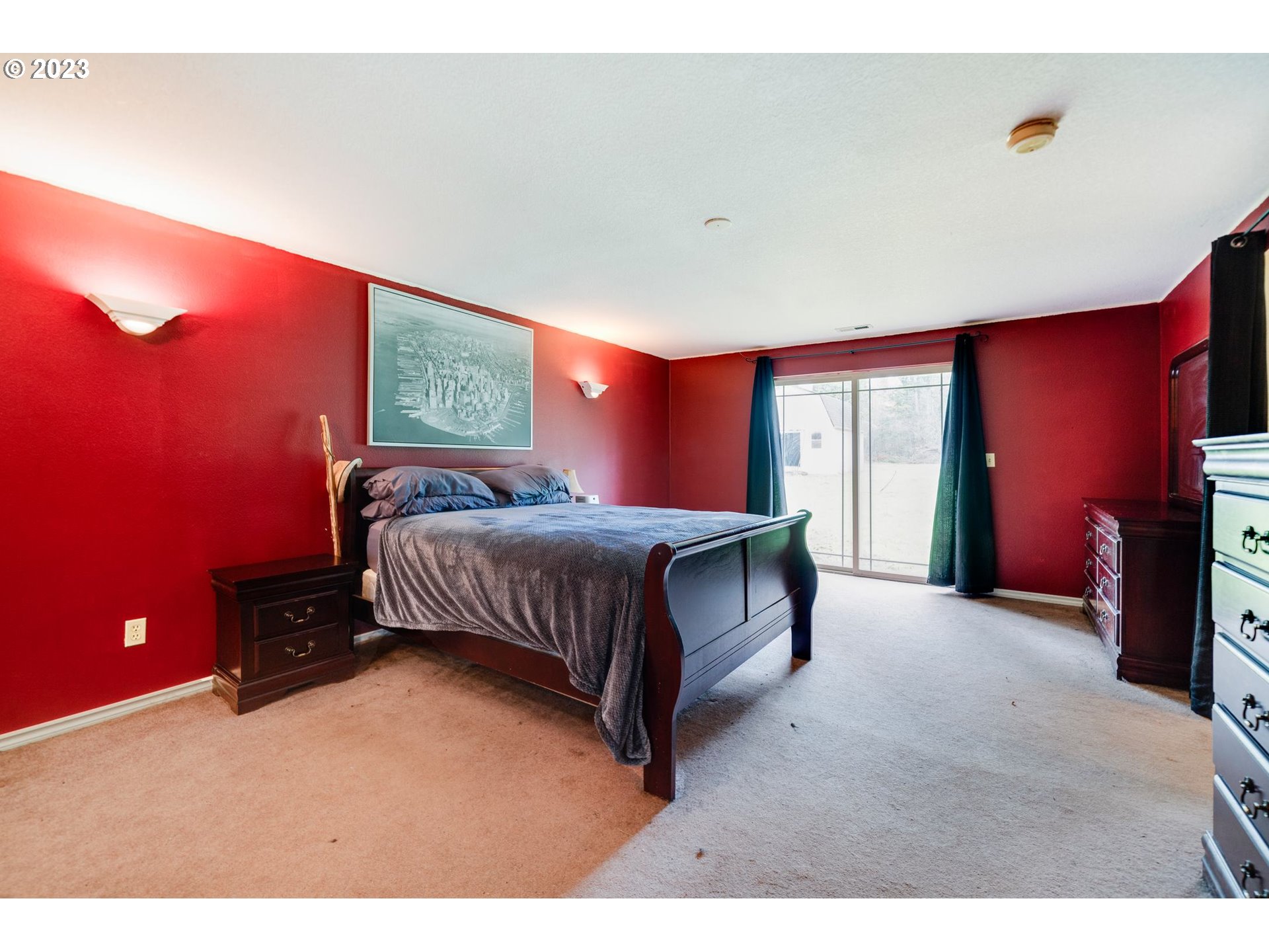 17802 Northeast 219th Street Battle Ground, WA 98604 - Photo 21 of 42 a bedroom with a bed and a window