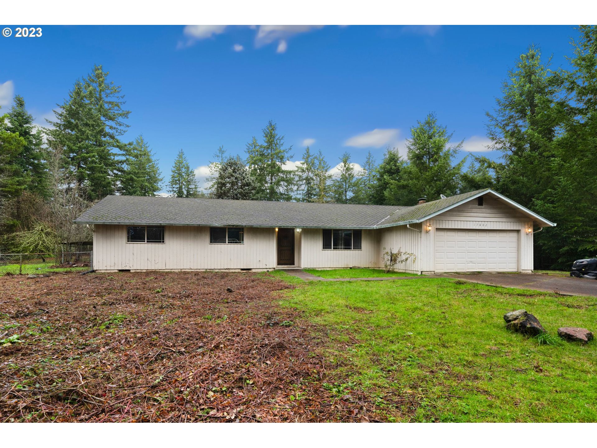 17802 Northeast 219th Street Battle Ground, WA 98604 - Photo 3 of 42 a view of a house with a yard