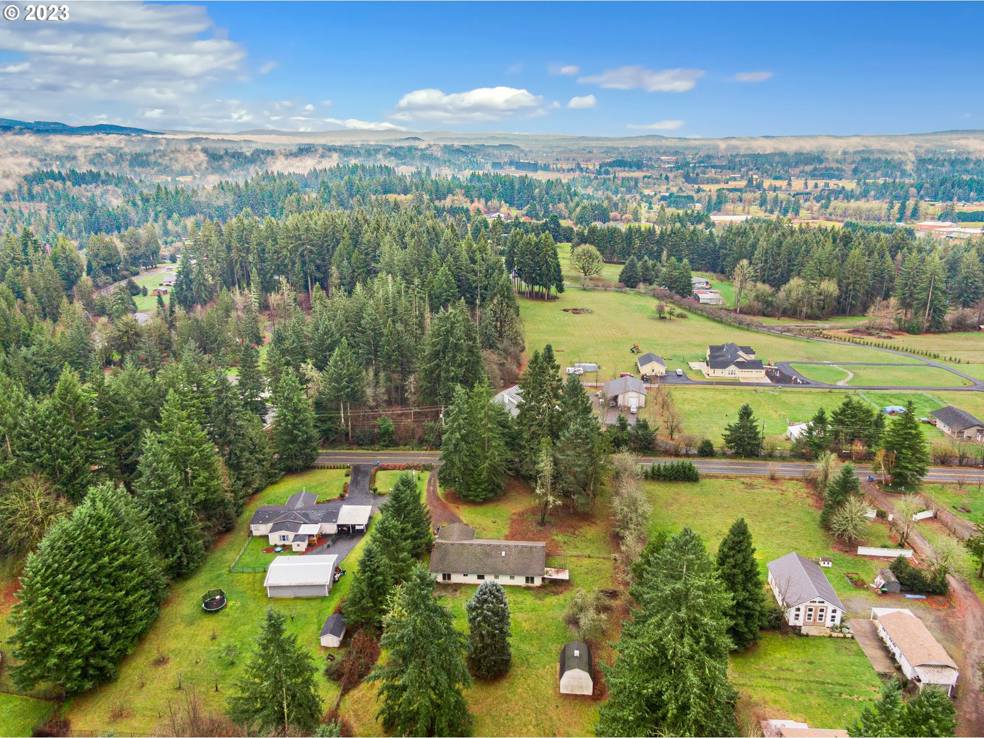 17802 Northeast 219th Street Battle Ground, WA 98604 - Photo 37 of 42 an aerial view of lake residential houses with outdoor space and swimming pool