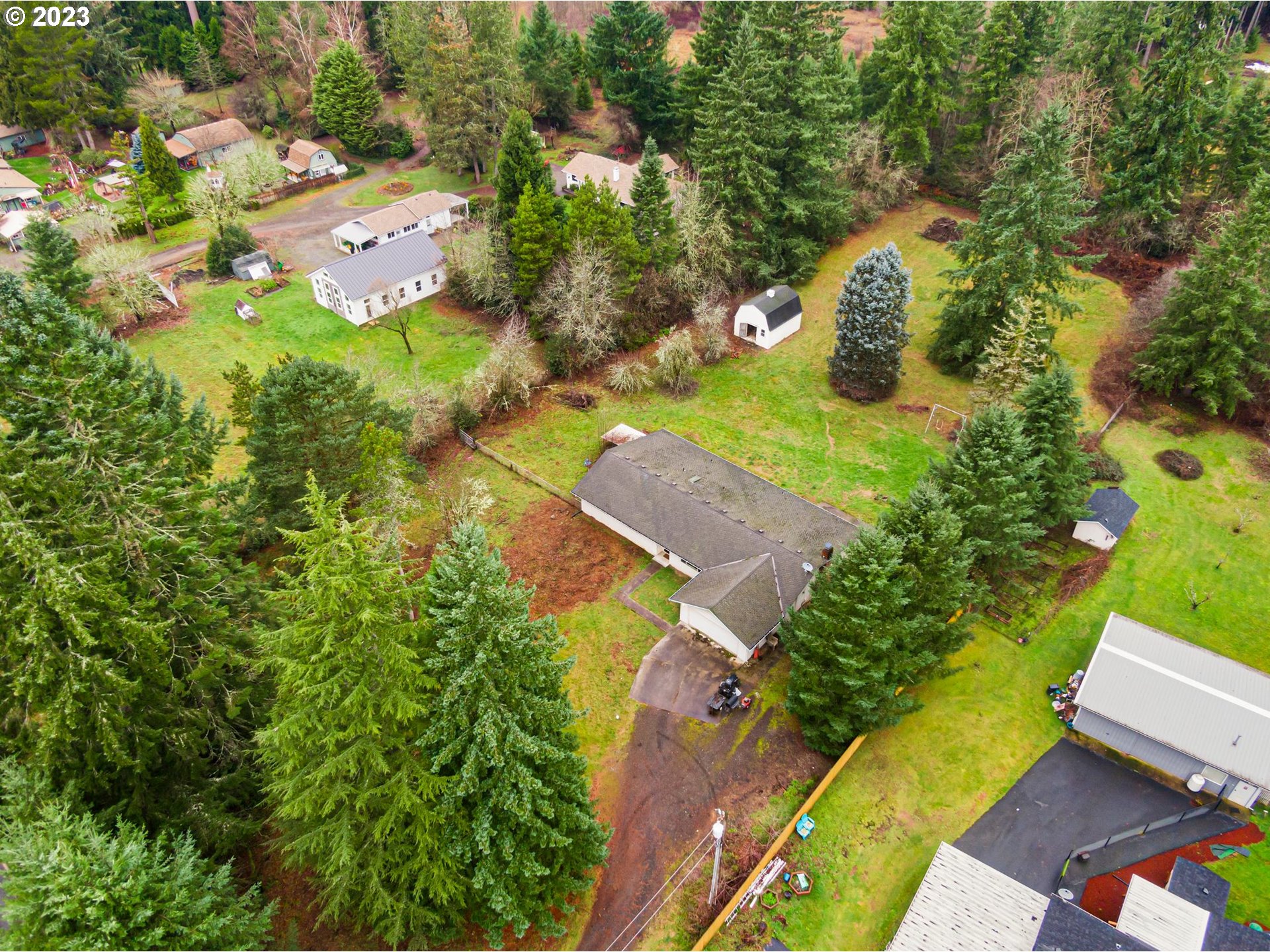 17802 Northeast 219th Street Battle Ground, WA 98604 - Photo 40 of 42 an aerial view of a house with a yard