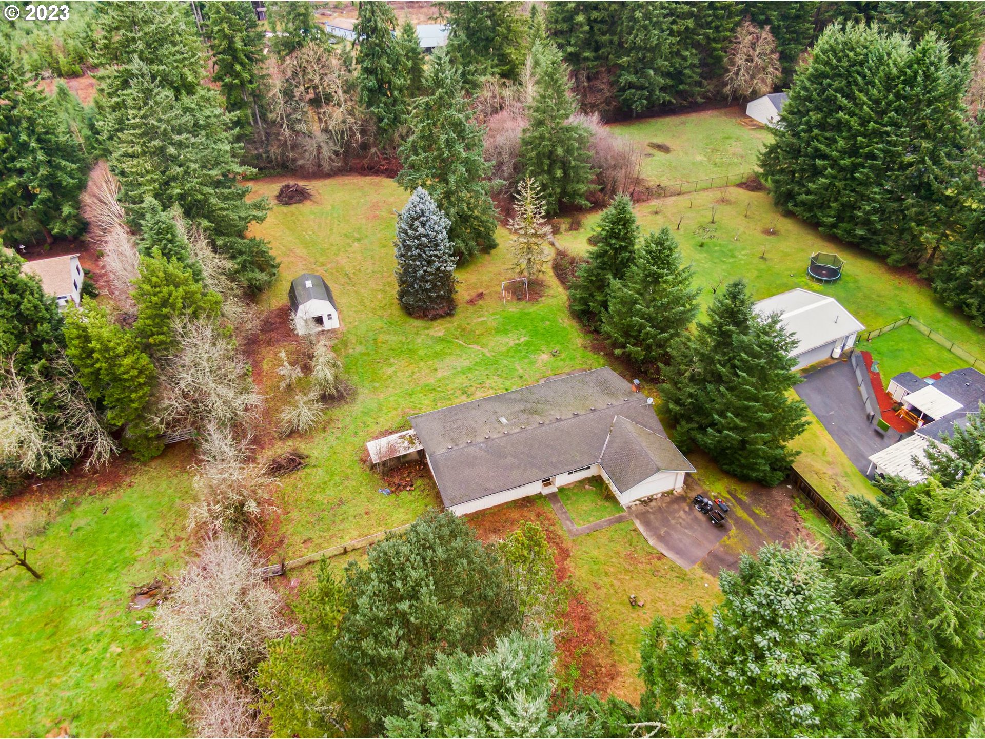 17802 Northeast 219th Street Battle Ground, WA 98604 - Photo 41 of 42 an aerial view of a house with a yard