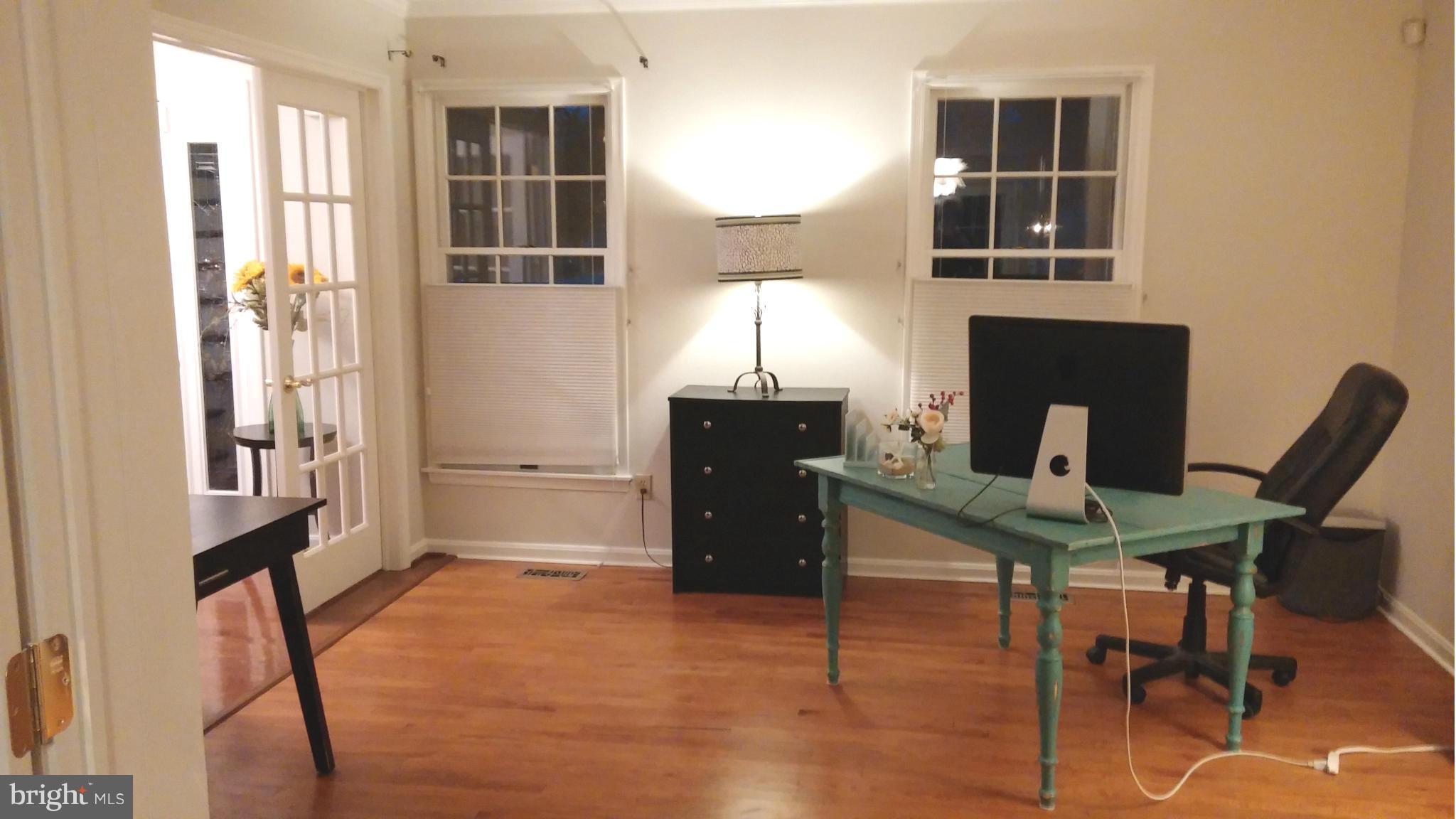 5605 Gunner Run Road Churchton, MD 20733 - Photo 12 of 30 a view of a workspace with furniture and a window
