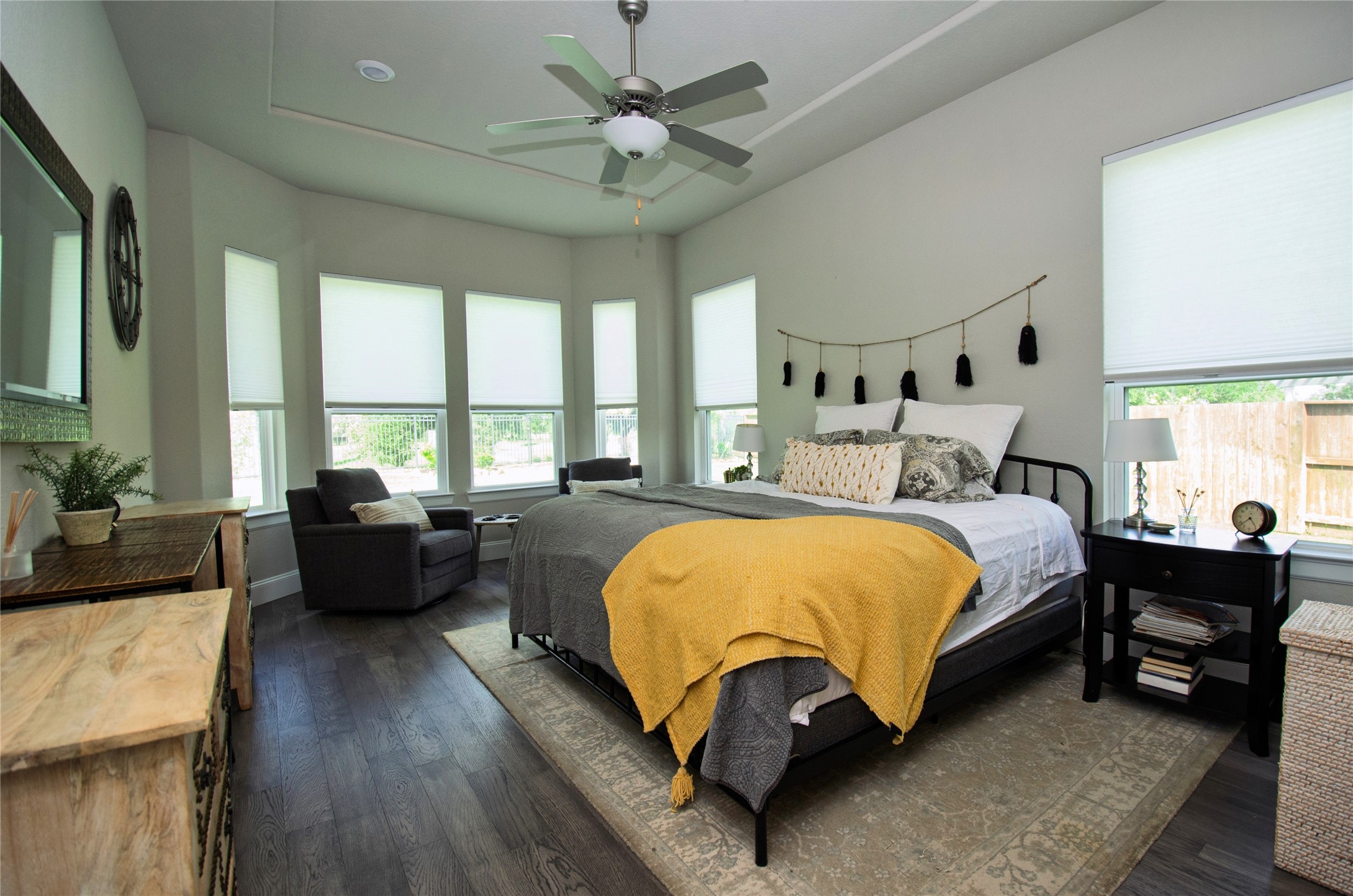 4143 Shackleton Court Iowa Colony, TX 77583 - Photo 14 of 34 The primary bedroom features a bay window and a ceiling fan.
