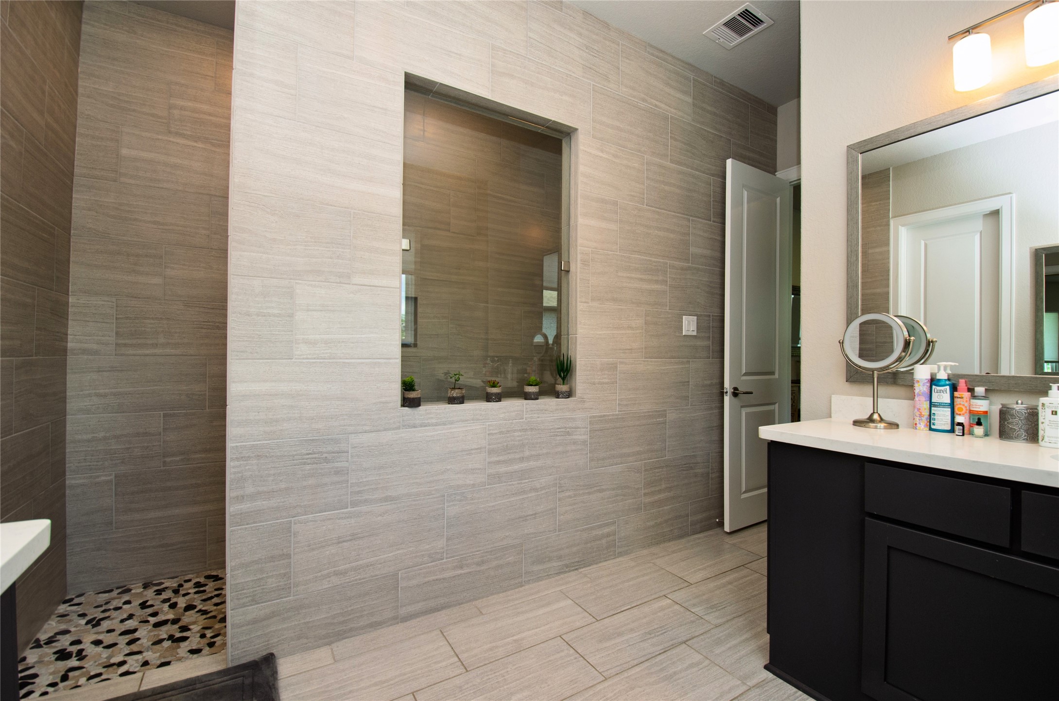 4143 Shackleton Court Iowa Colony, TX 77583 - Photo 17 of 34 Walk-in shower and one of the two vanities.